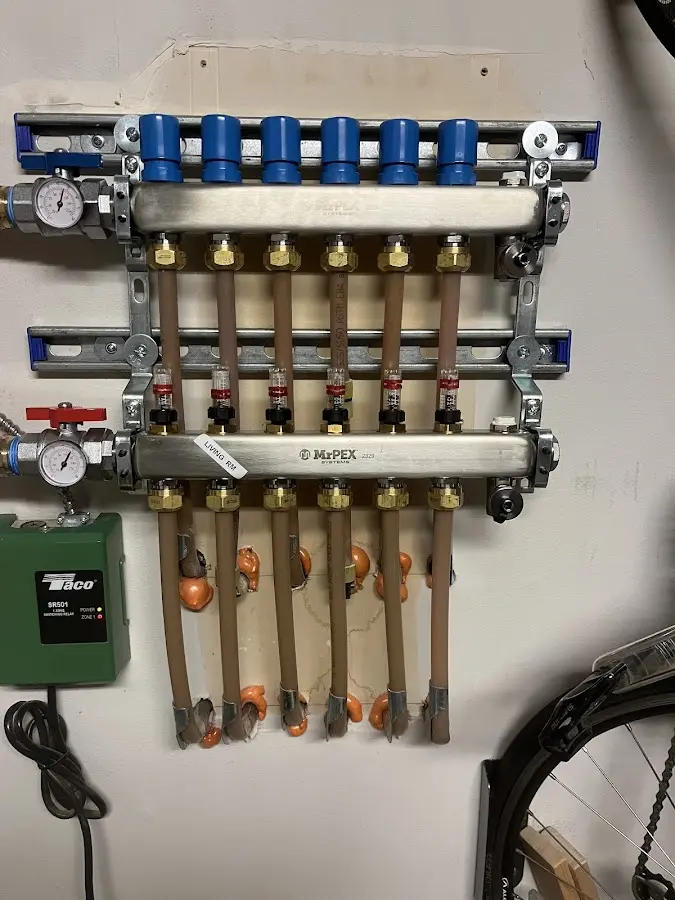 Plumber performing Water Heater Repair at a residential property in Irvington